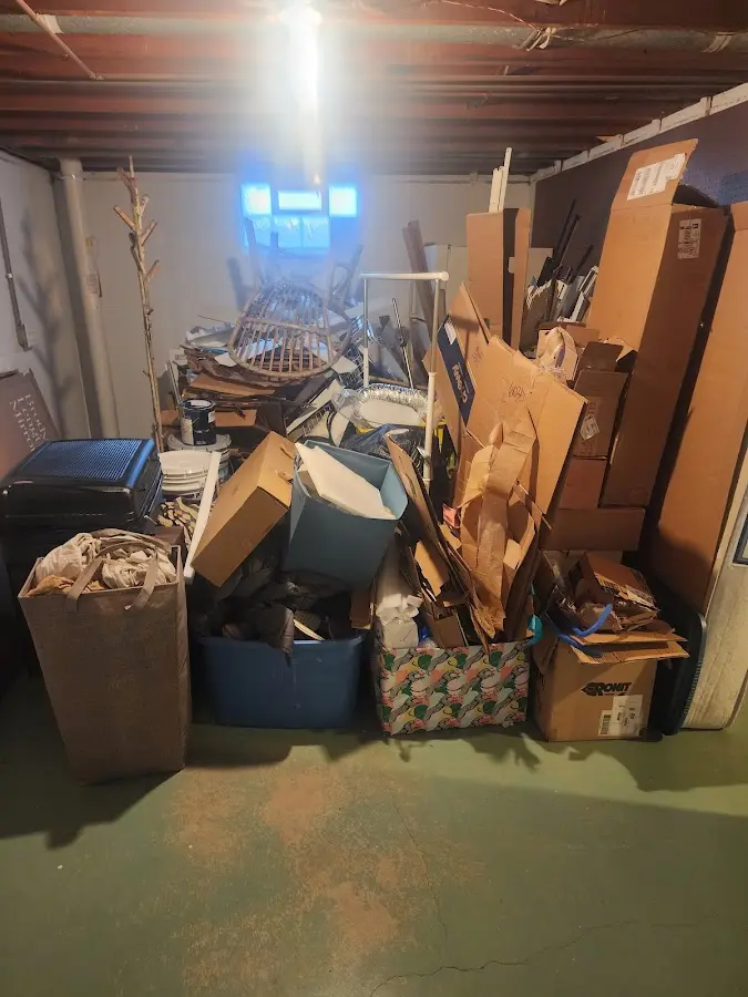 Roll-off dumpster container at job site for 20 Yard Dumpster Rental in Brewton